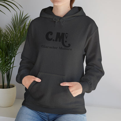 "CM" character matters" Unisex Heavy Blend™ Hooded Sweatshirt