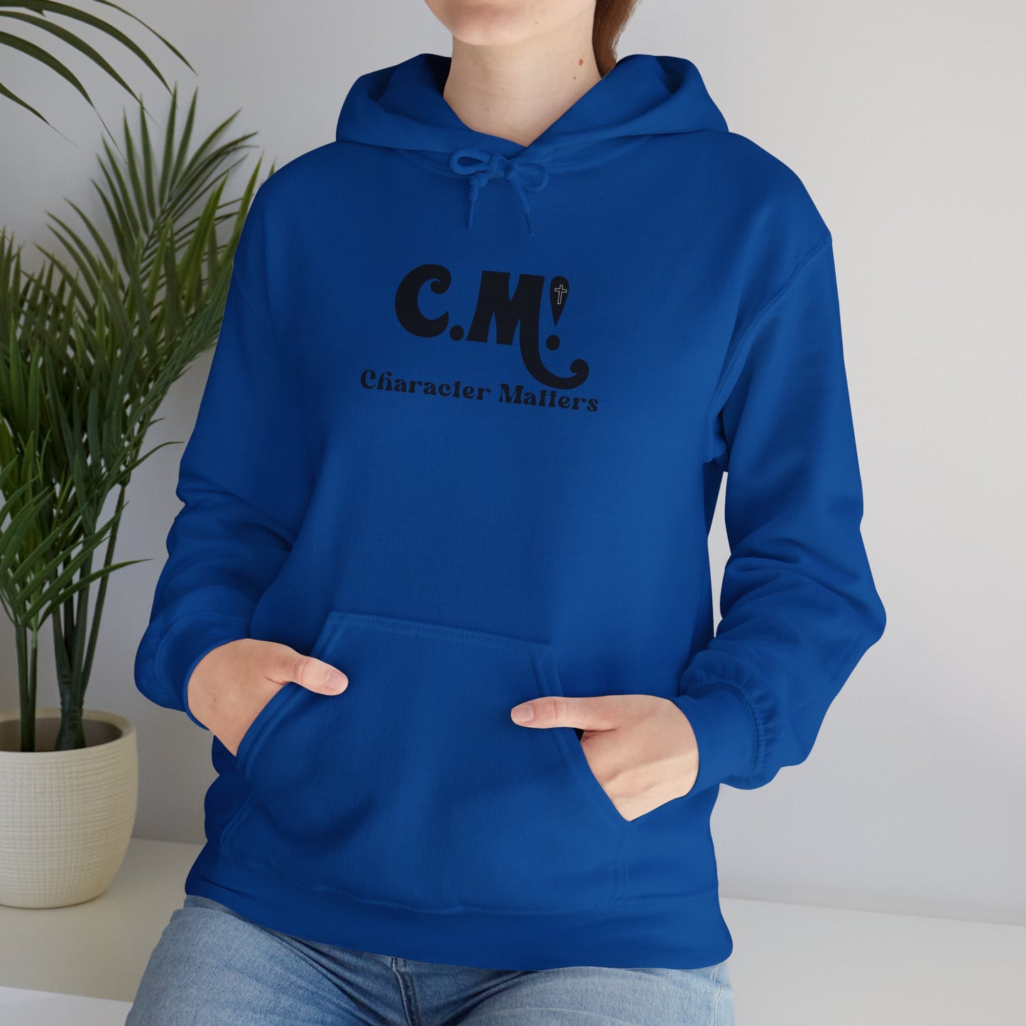 "CM" character matters" Unisex Heavy Blend™ Hooded Sweatshirt